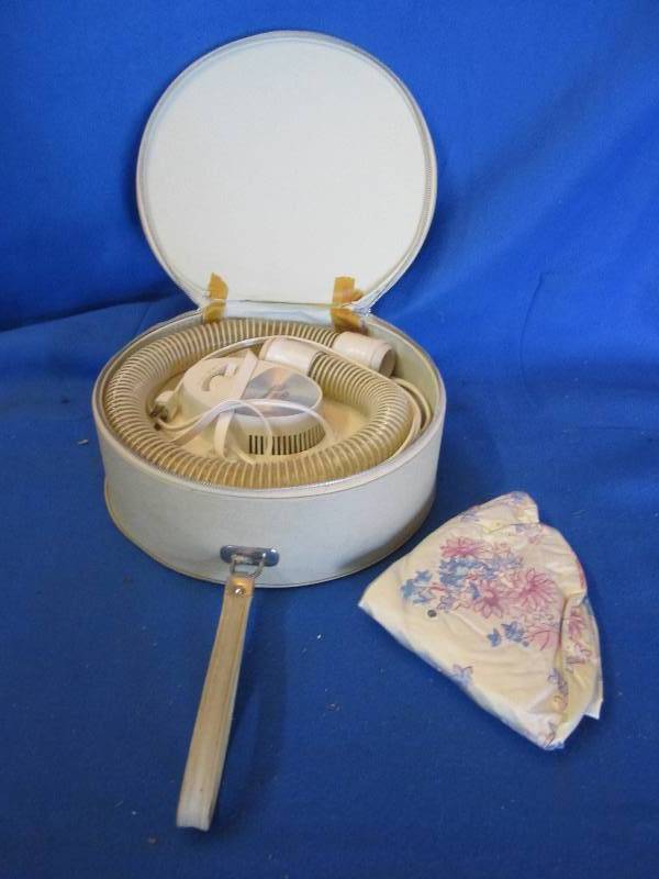 lot 103 image: Vintage Presto hair dryer in case...