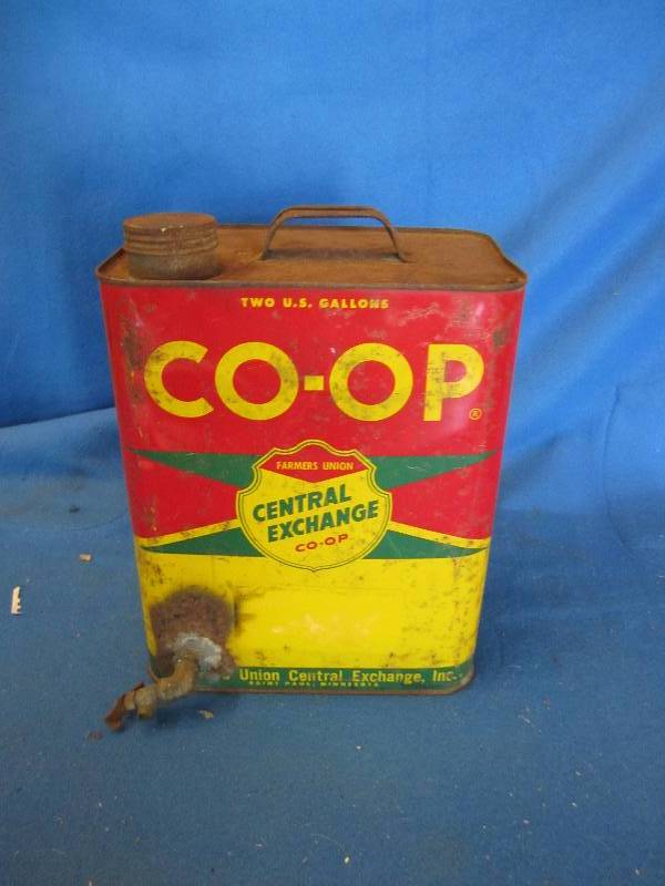 lot 115 image: Vintage Co-Op can with spigot in th...