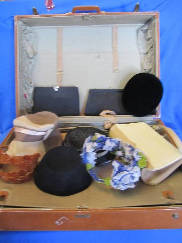 lot 125 image: Vintage suitcase filled with ladies...