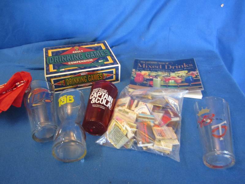 lot 143 image: Drinking games and glasses...