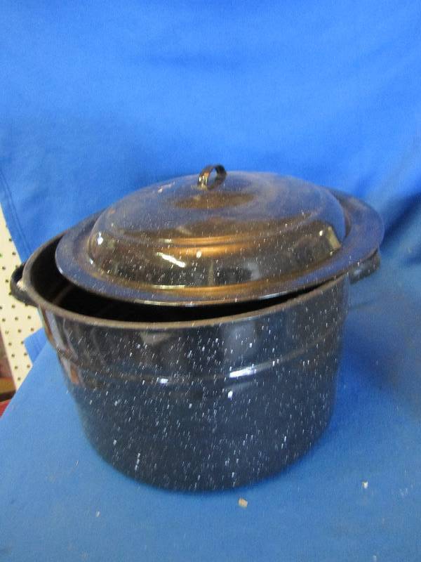 lot 151 image: Stock pot with metal riser in the b...