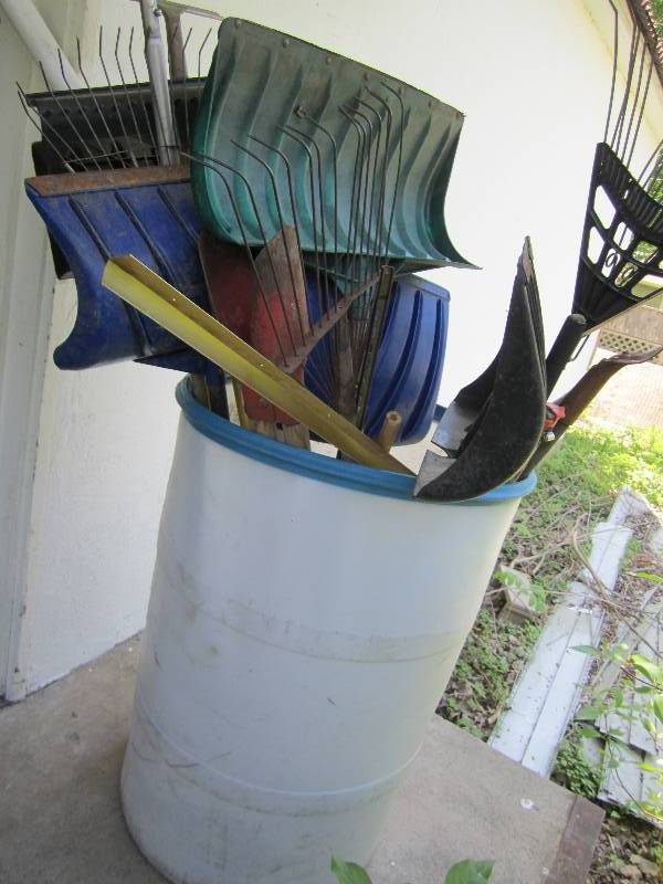 lot 181 image: Huge bin of snow shovels and rakes...
