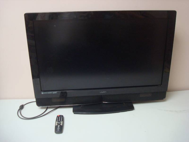 lot 1 image: Vizio 37 Flat Screen TV, Used, Works Fine, Has A Universal Remote With It