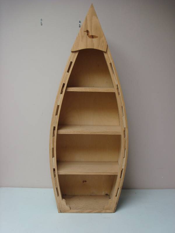 lot 10 image: Wood Boat Book Shelf, Has Some Wear To It