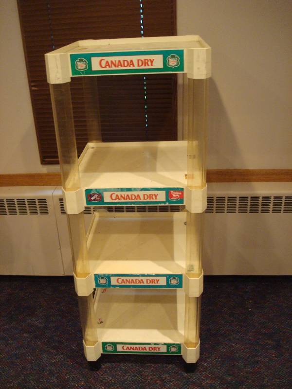 lot 19 image: Canada Dry Soda Plastic Pop Up Shelf, Used, Some Wear