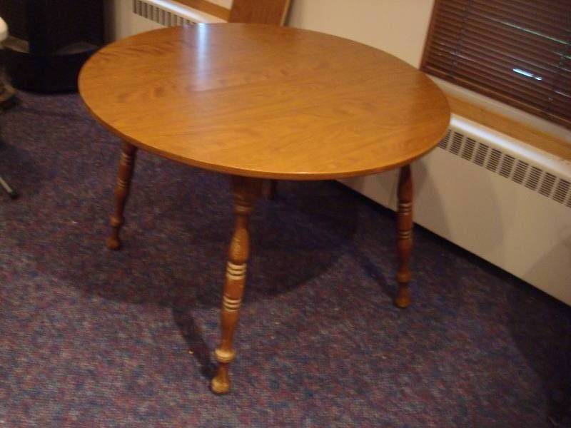 lot 21 image: Round Kitchen Table, Has Wear, Scuffs On Legs