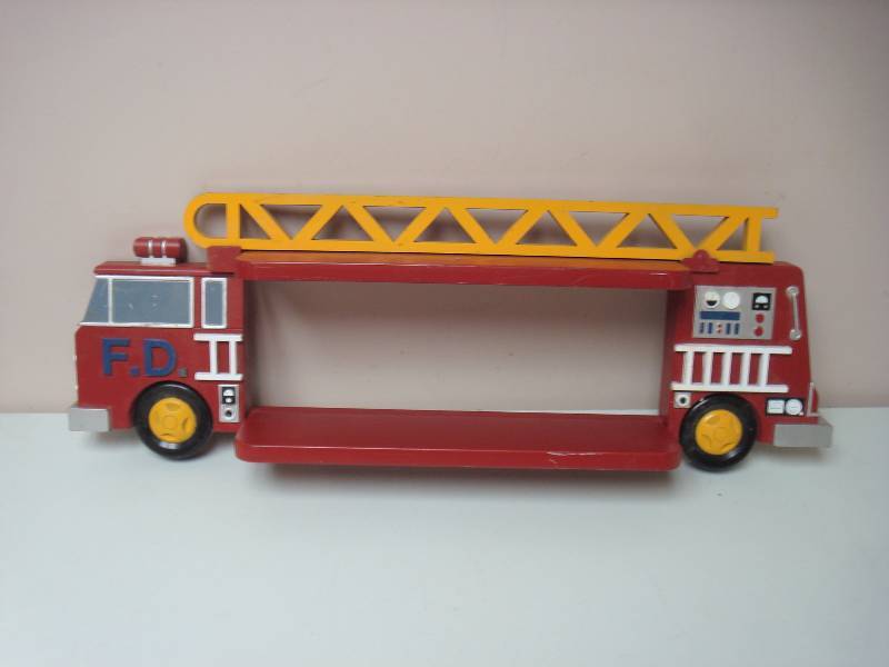 lot 35 image: Plastic Hanging Fire Engine Shelf, Used, Some Wear Marks