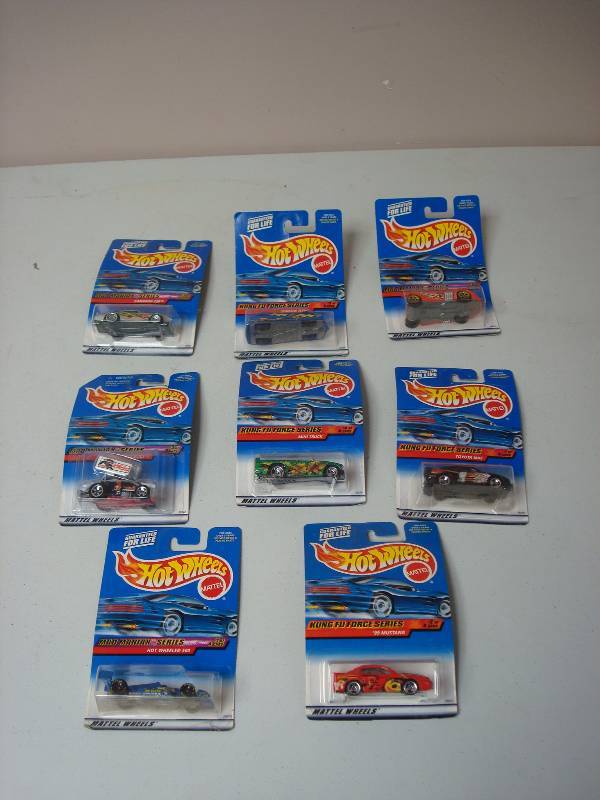 lot 54 image: Lot Of Sealed Hot Wheel Cars, Some Bend To Packages