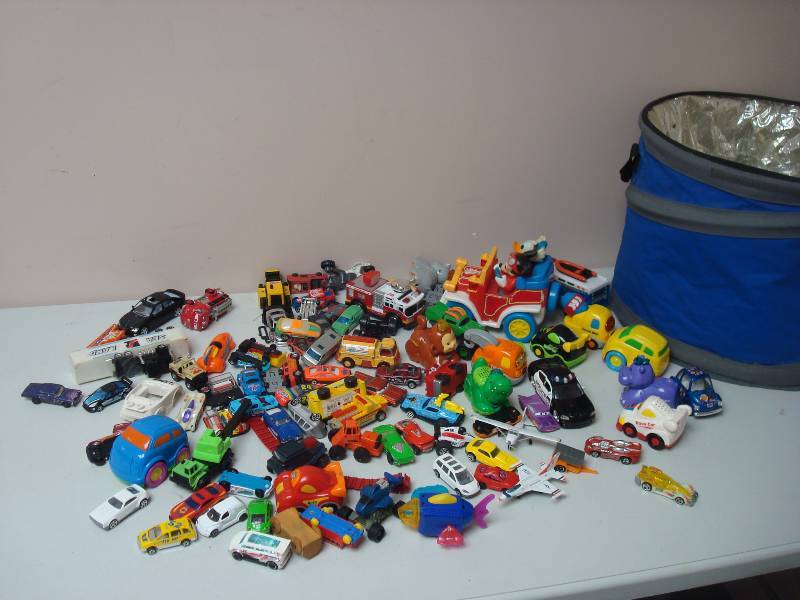 lot 62 image: Cooler Bag Filled with All Kinds Of Different Cars