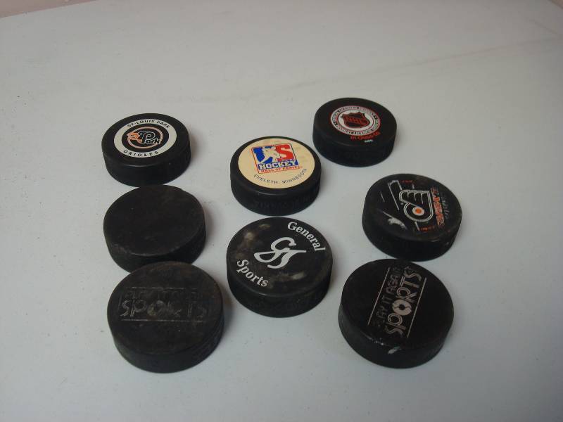 lot 66 image: Lot Of Hockey Pucks