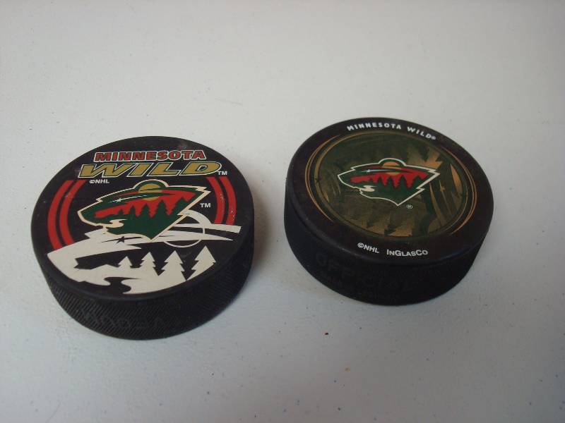 lot 68 image: Pair On Minnesota Wild Hockey Pucks