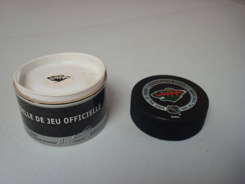 lot 70 image: Minnesota Wild Hockey Puck In Case