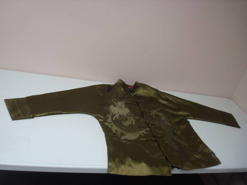 lot 88 image: Green Asian Jacket, Says Size XL But Its More Like A Medium, It Might Be Kids
