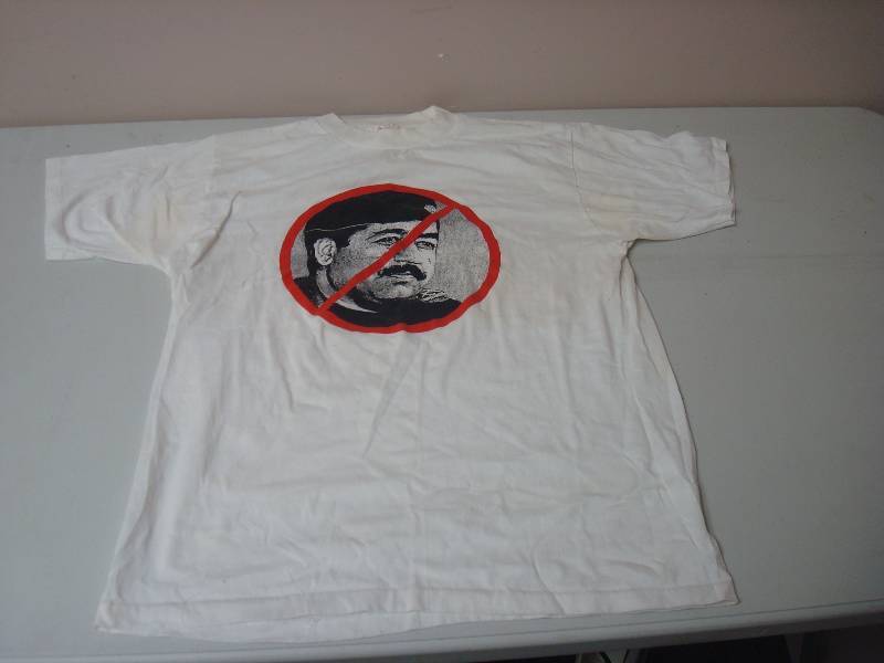 lot 92 image: Vintage Saddam Hussein T-Shirt, Some Stains