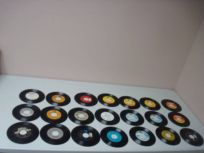 lot 115 image: Lot Of 21 -  7 Vinyl LP 45 Records, Used, Some Show Wear, NWA, Madonna, New Kids, See Pics For Titles