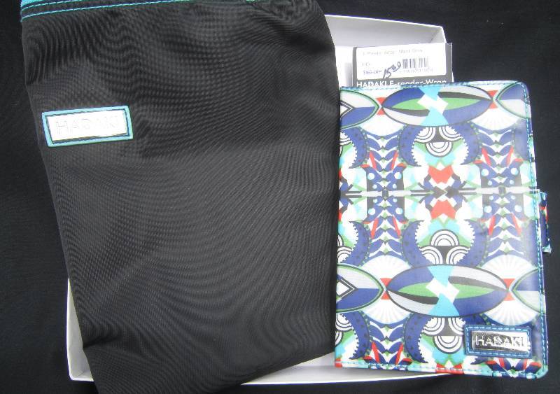 lot 203 image: NEW E-READER WRAP & ZIP CARRY ALL POD BY HADAKI