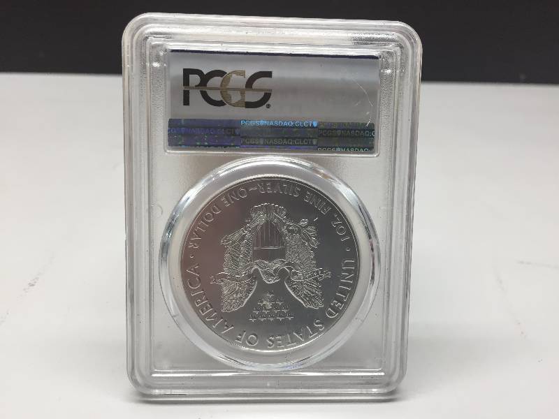 DOLLAR COIN- THE WEST POINT MINT, FIRST STRIKE, SILVER EAGLE, 30TH ANNIVERSARY
