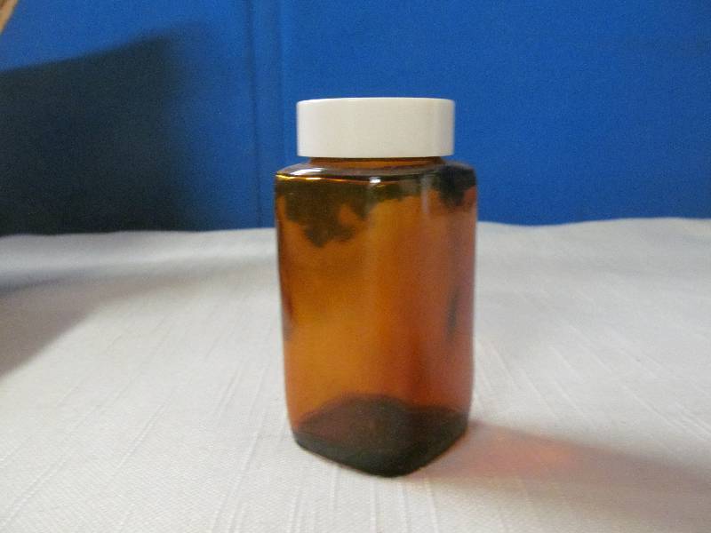 lot 39 image: amber glass bottles