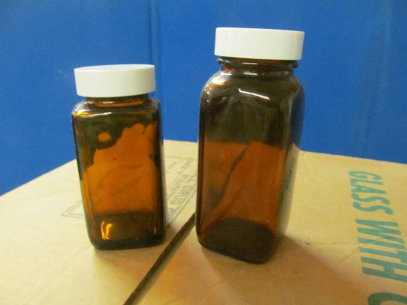 lot 41 image: amber glass bottles