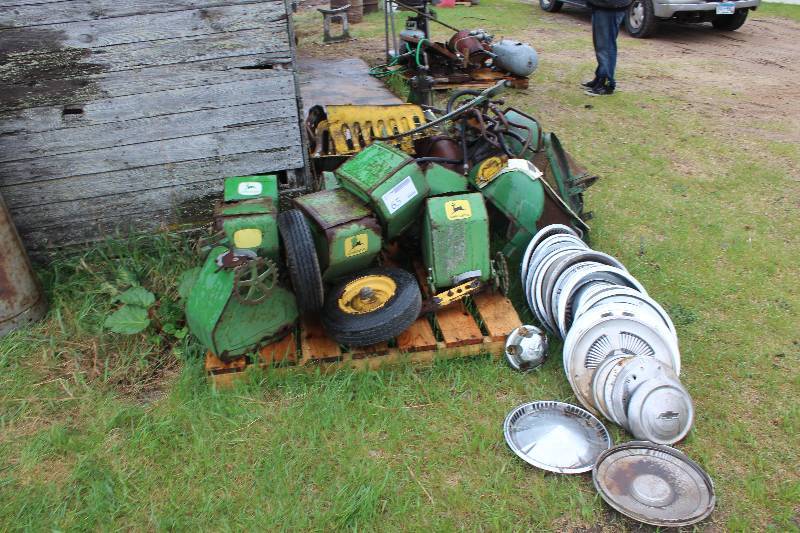 lot 65 image: Lot Including John Deere Tractor Parts Various Auto Hubcaps