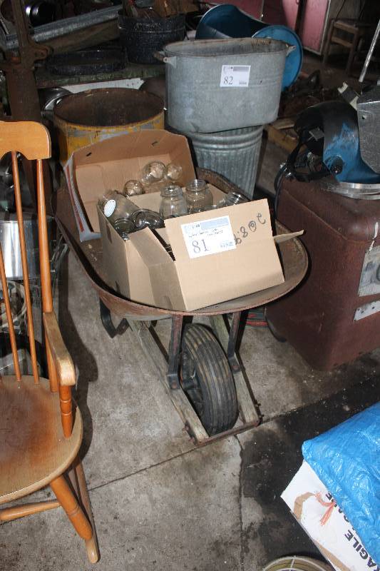 lot 81 image: Wheelbarrow and Contents of Mason Jars
