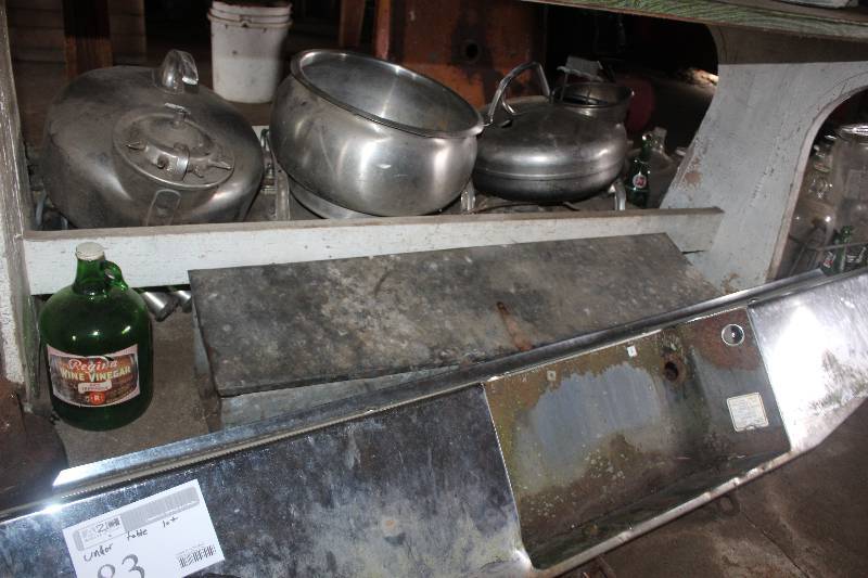 lot 83 image: Under Table Lot Including Commercial 10Drop Truck Bumper Commercial Cooking Pots Glass Jugs