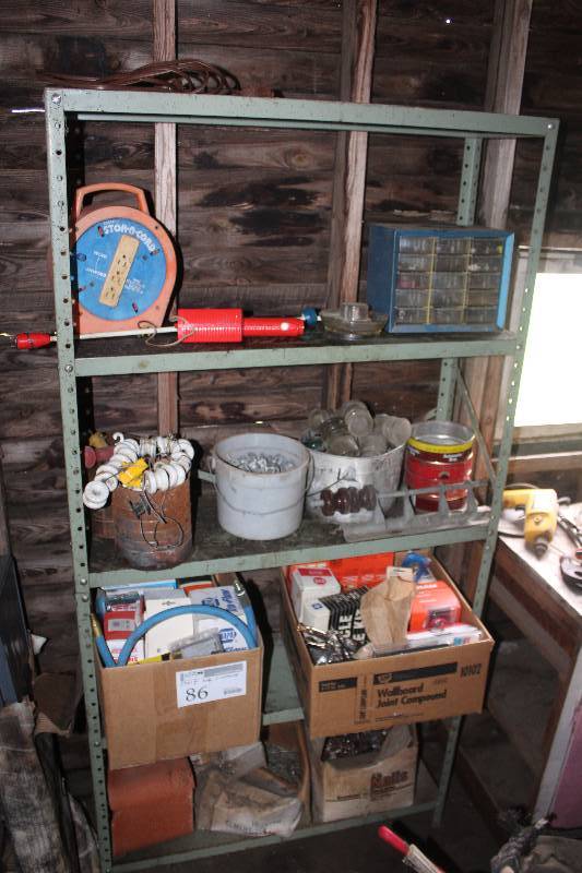 lot 86 image: Shelf and Contents Including Cord Storage Organizers Air Compressor Hose Fuel Pump Engine Heater Car Parts