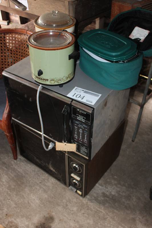 lot 104 image: Stack Lot of Appliances Including Crock Pots Microwaves