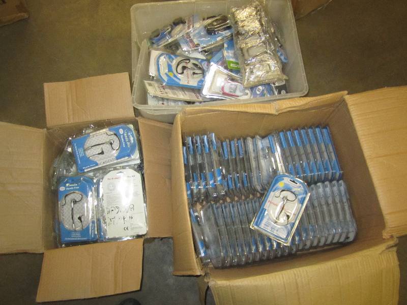3 cases of hands free ear piece att...