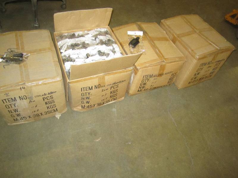 4 cases of assorted cell phone acce...