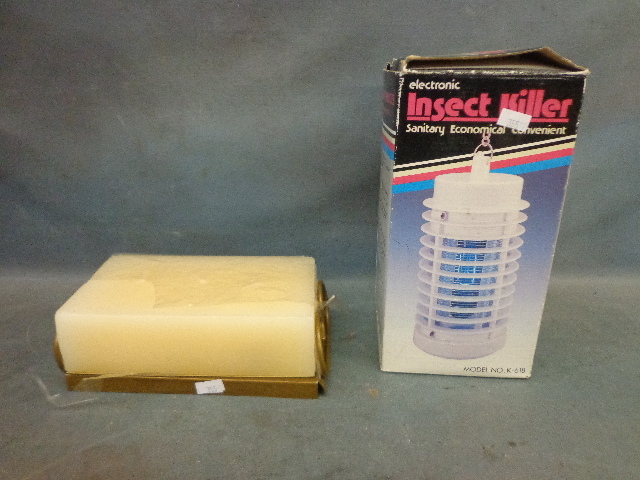 lot 23 image: Block Candle & Stand With Insect Killer
