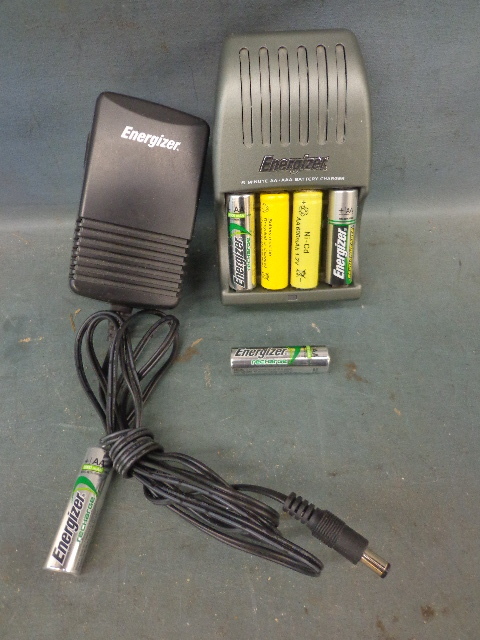 lot 72 image: Energizer Battery Charger & Some AA  Batteries