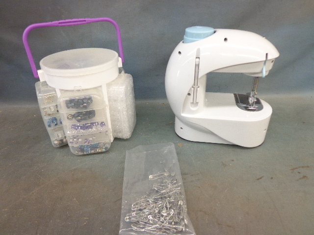 lot 100 image: Sewing Machine & Organizer