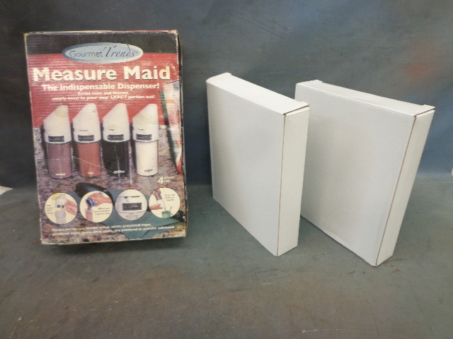 lot 102 image: Campbells Recipe Books & Measuring Maids