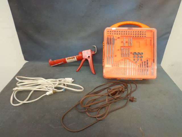 lot 112 image: Extension Cords, Caulking Gun & Tool Accessory Organizer