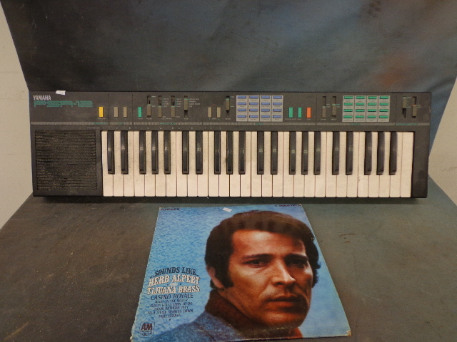 lot 122 image: Yamaha Key Board & Herb Alpert Record Album