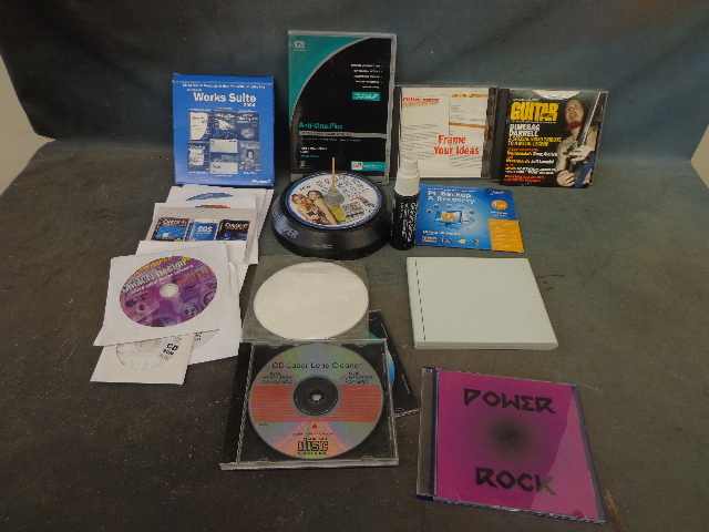 lot 125 image: Computer Disk, Cleaning Solution & More