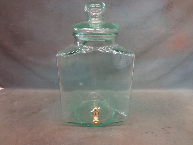 lot 130 image: Triangular Green Glass Container With Spout & Lid