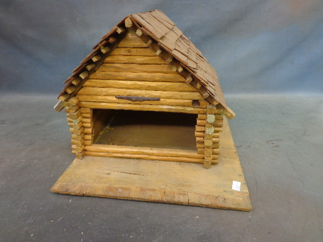 lot 142 image: Hand Made Log Cabin