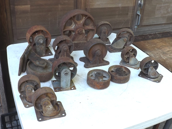 lot 10 image: Large Lot of Heavy Iron Industrial Nutting Cart, etc. Wheels
