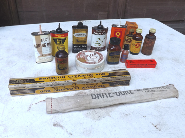 lot 18 image: Lot of Collectible Gun Oil Cans etc.