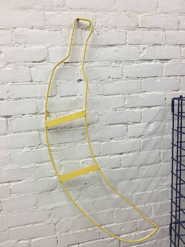 lot 19 image: metal gridwall display with metal hanging banana