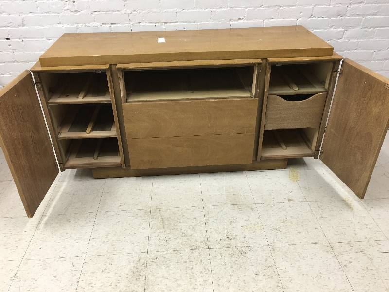 lot 26 image: heavy duty brown dresser on wheels