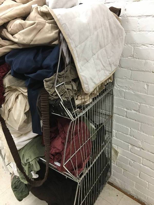 lot 366 image: large bin of  couch,chair and futon covers