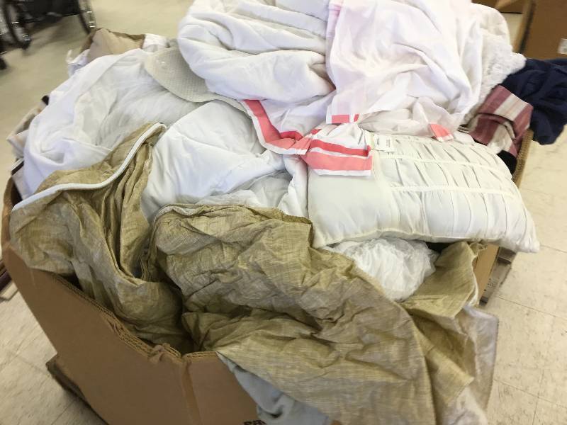lot 381 image: Large gaylord of new sheets,couch covers and curtains random sizes and colors   name brand items