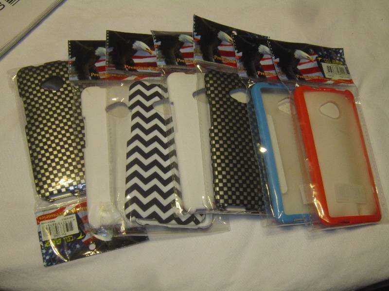NEW  From a T-MOBILE Store  7 PHONE CASES