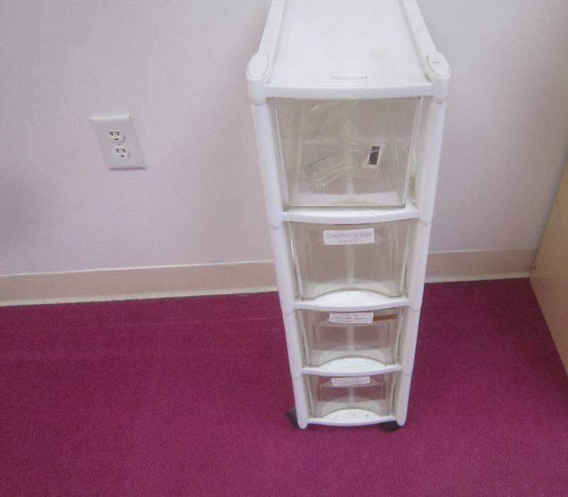 SET OF PLASTIC STORAGE BINS 4 HIGH ON WHEELS