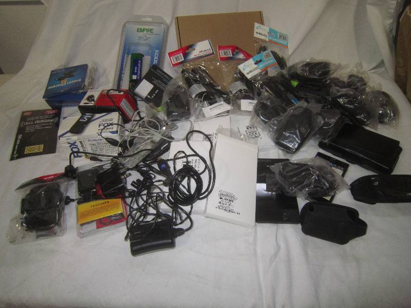 From a T-MOBILE STORE-PHONES, CASES, CORDS, MUCH MISC