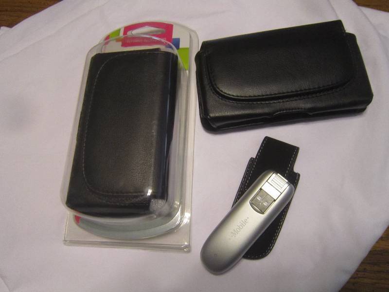 NEW From a T-MOBILE STORE 2 CLIP CASES UNIVERSAL DROIDX2 AND SIMILAR