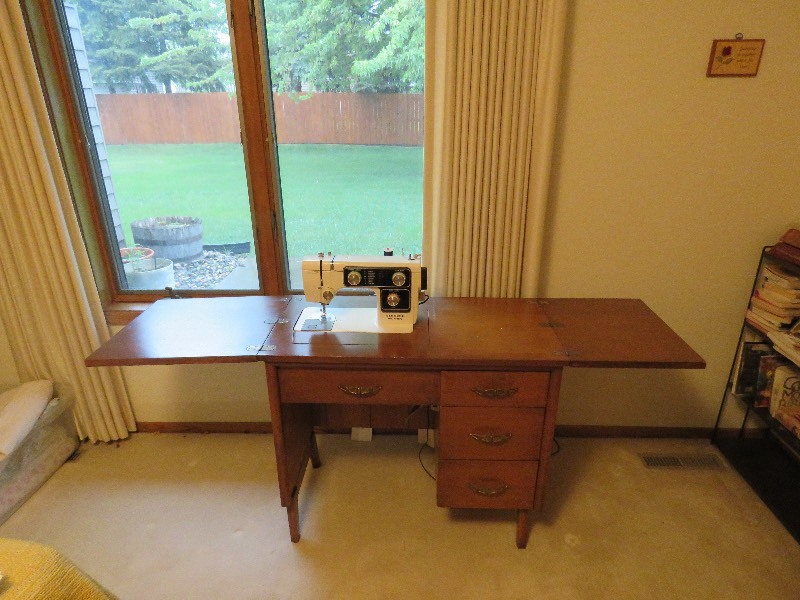 Vintage Sewing Machine in Wood Cabinet